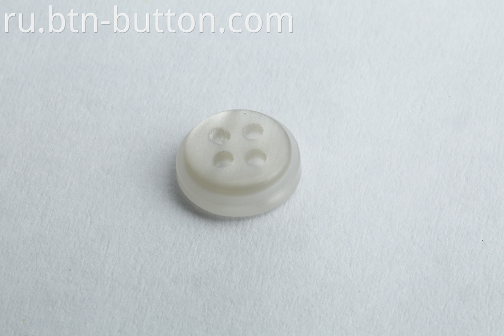 Pearly transparent bottom buttons for shirts